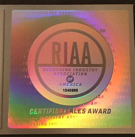 RIAA record award seal 2013 on