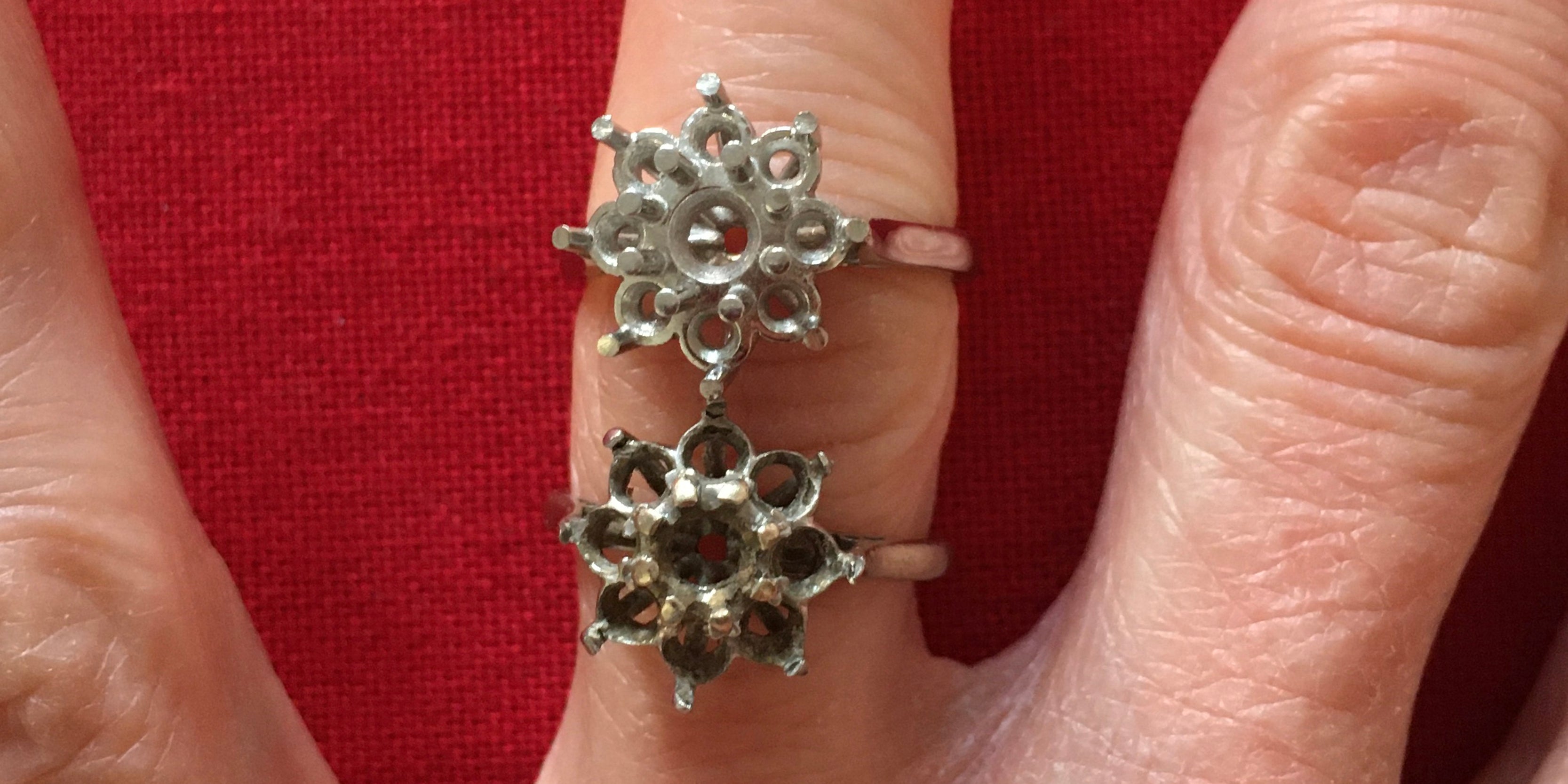 Handmade bespoke platinum cluster ring compared to old one by Amanda Mansell