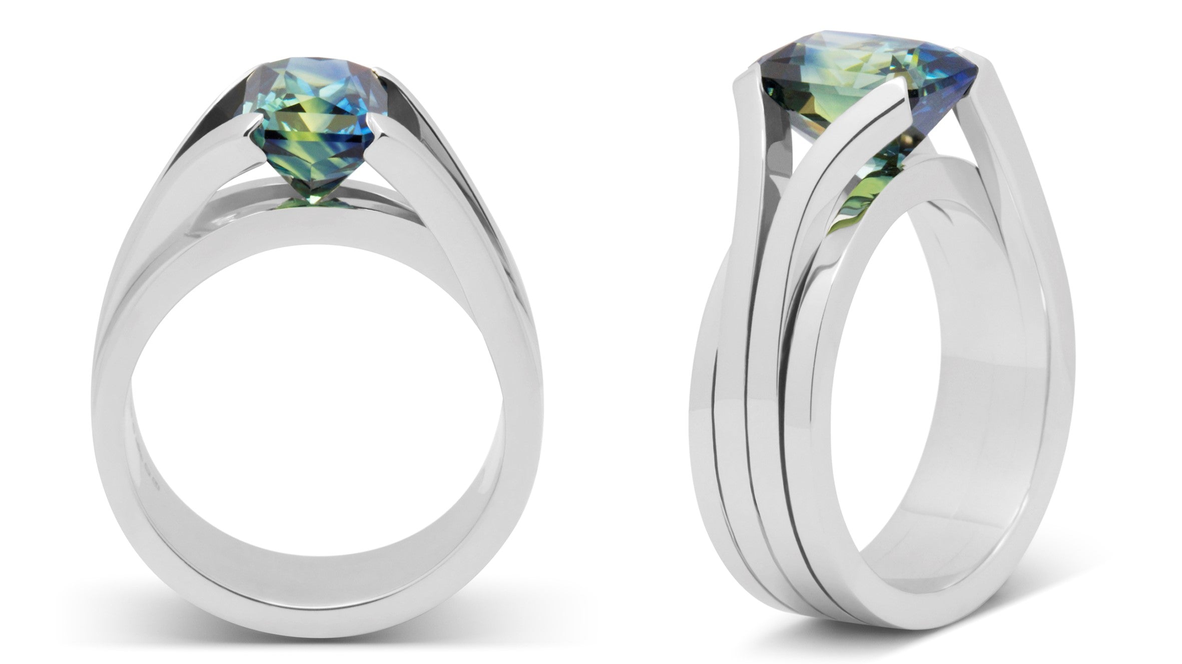 Bespoke platinum and blue green sapphire engagement ring design and made for Matt, by Amanda Mansell