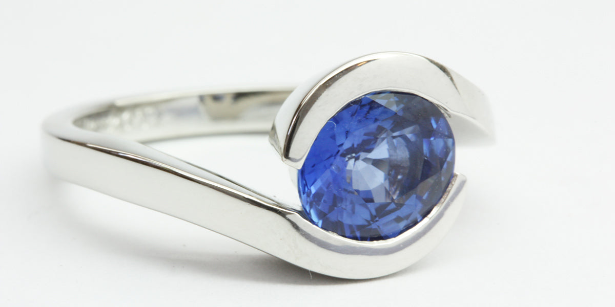 Platinum and blue sapphire engagement ring