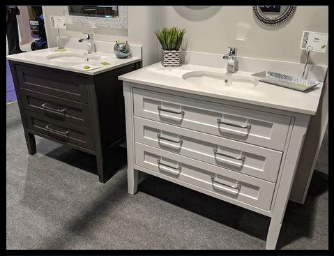 three drawer furniture vanity in white and dark gray available at DIrectCabinets.com