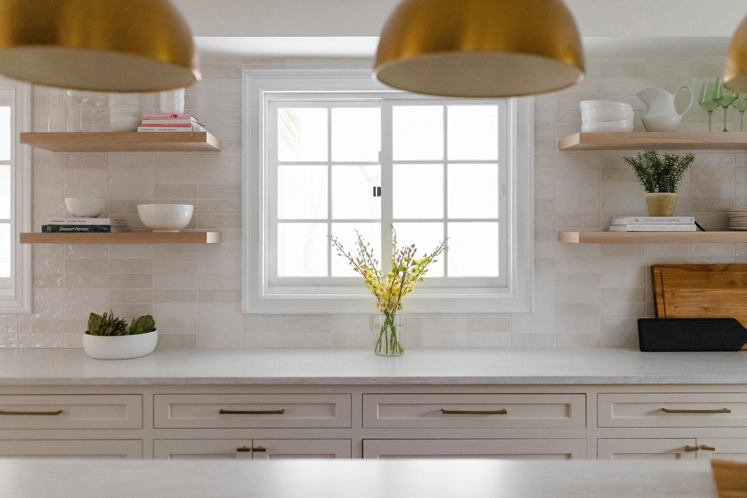 white inset kitchen with cambria ironsbridge countertops and white oak floating shelves by DirectCabinets.com