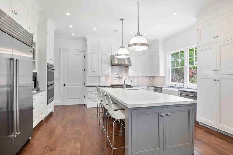 Kitchen remodel for resale. White and gray kitchen with kitchen island