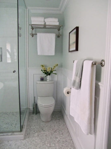 towel warmer or towel bar over the toilet