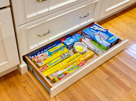 Toekick drawer with ziplock bags, saran wrap etc