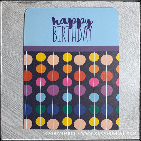 Shown here without the coordinating colored envelope, this handmade card helps celebrate a birthday with fun colors and a whimsical pattern. It's a great option for a child or an adult birthday as everyone can appreciate the happiness that in invokes. 