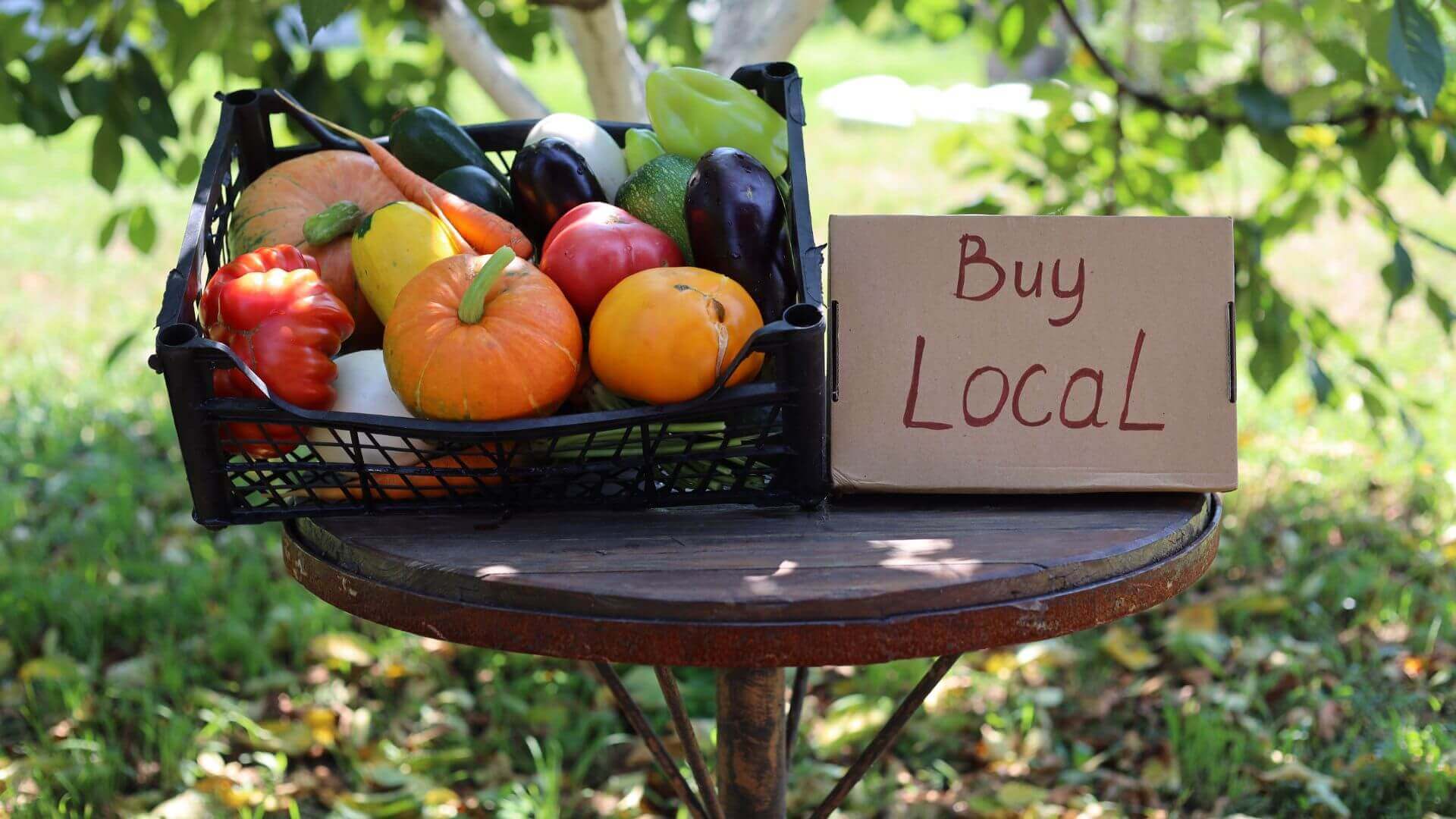 Collombatti Naturals 7 compelling reasons to buy Australian beeswax picture of a basket of vegetables and a sign support local