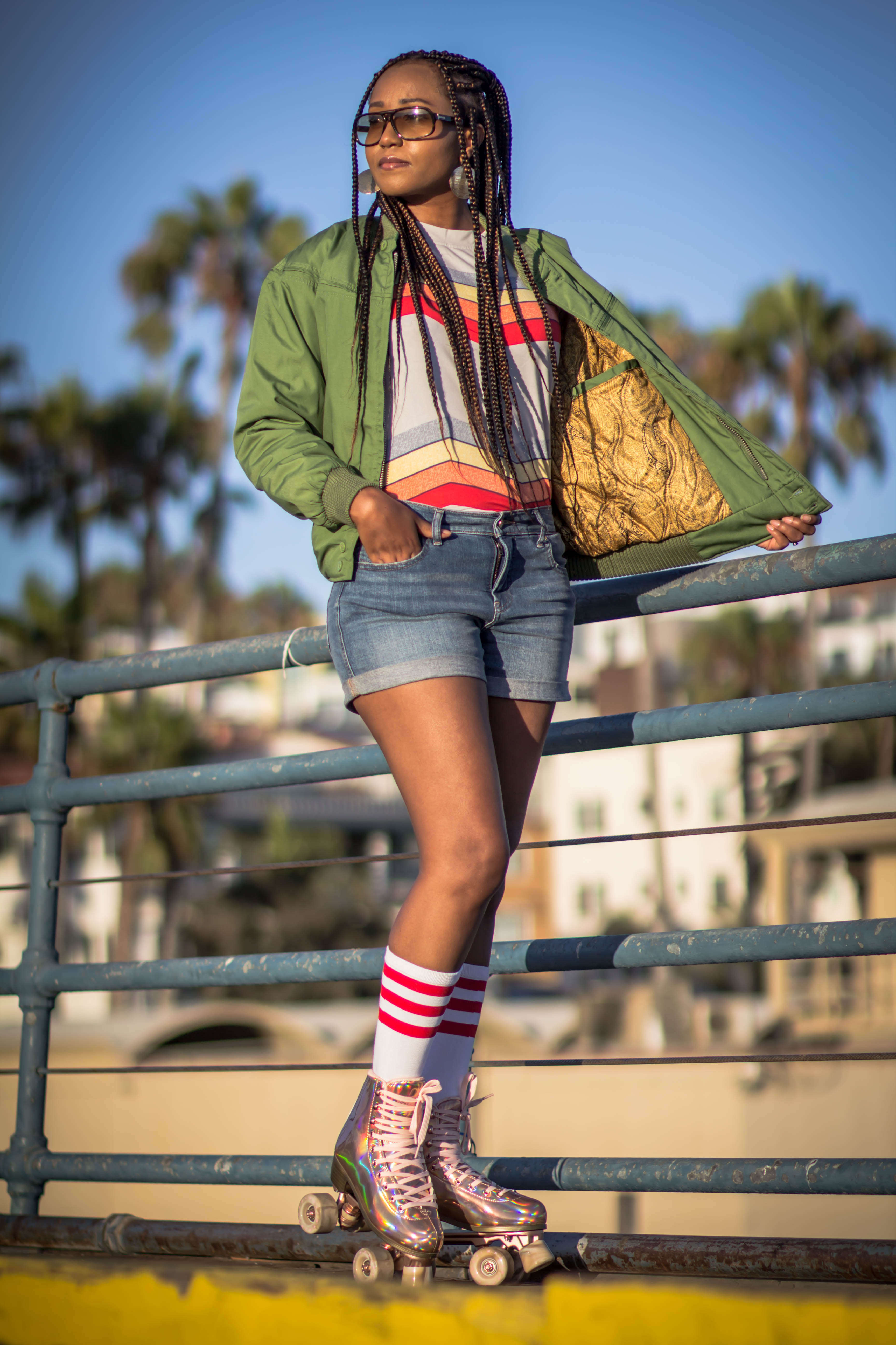 Woman wearing a moss green derby jacket