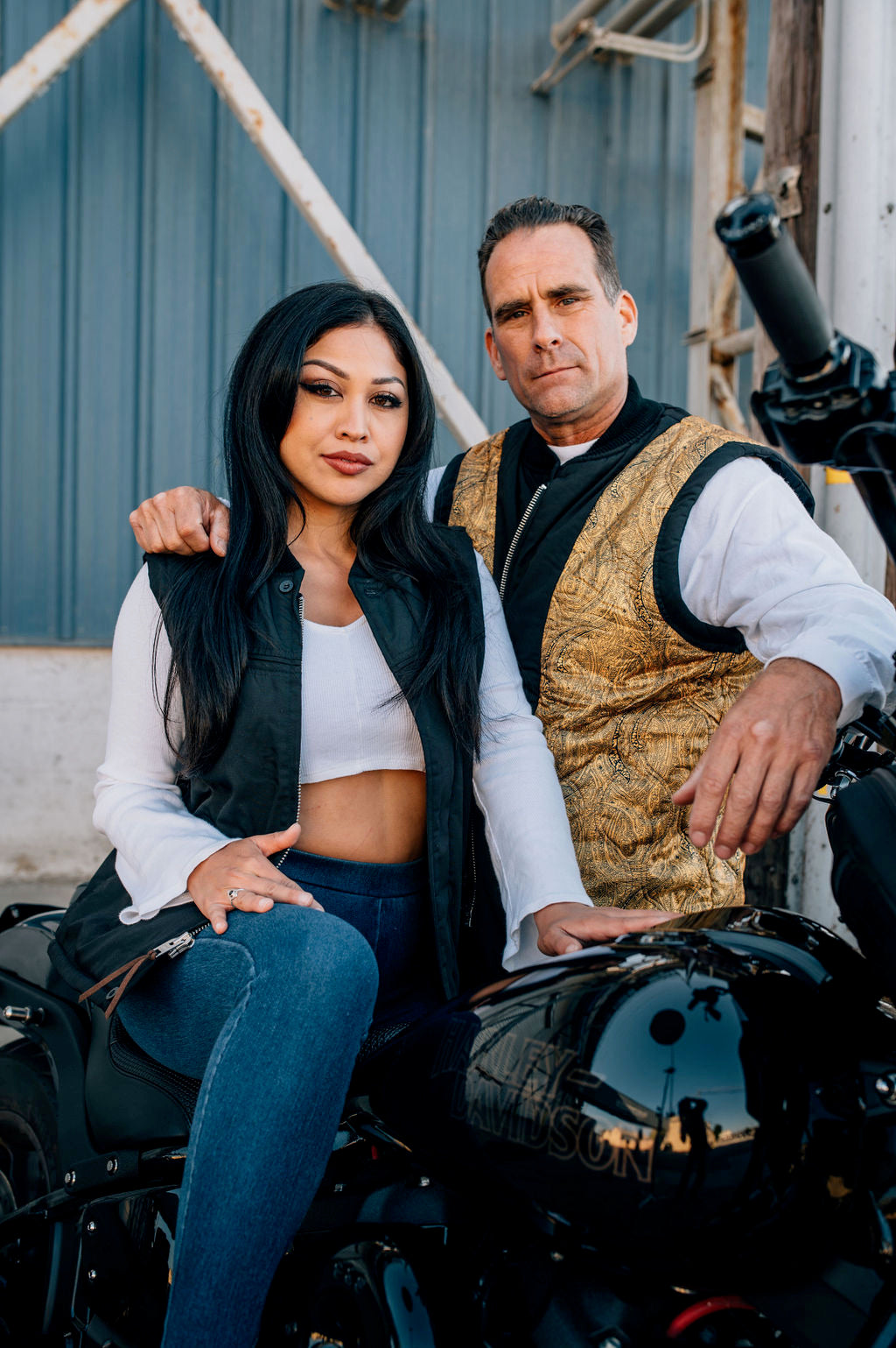 couple wearing a black derby vest