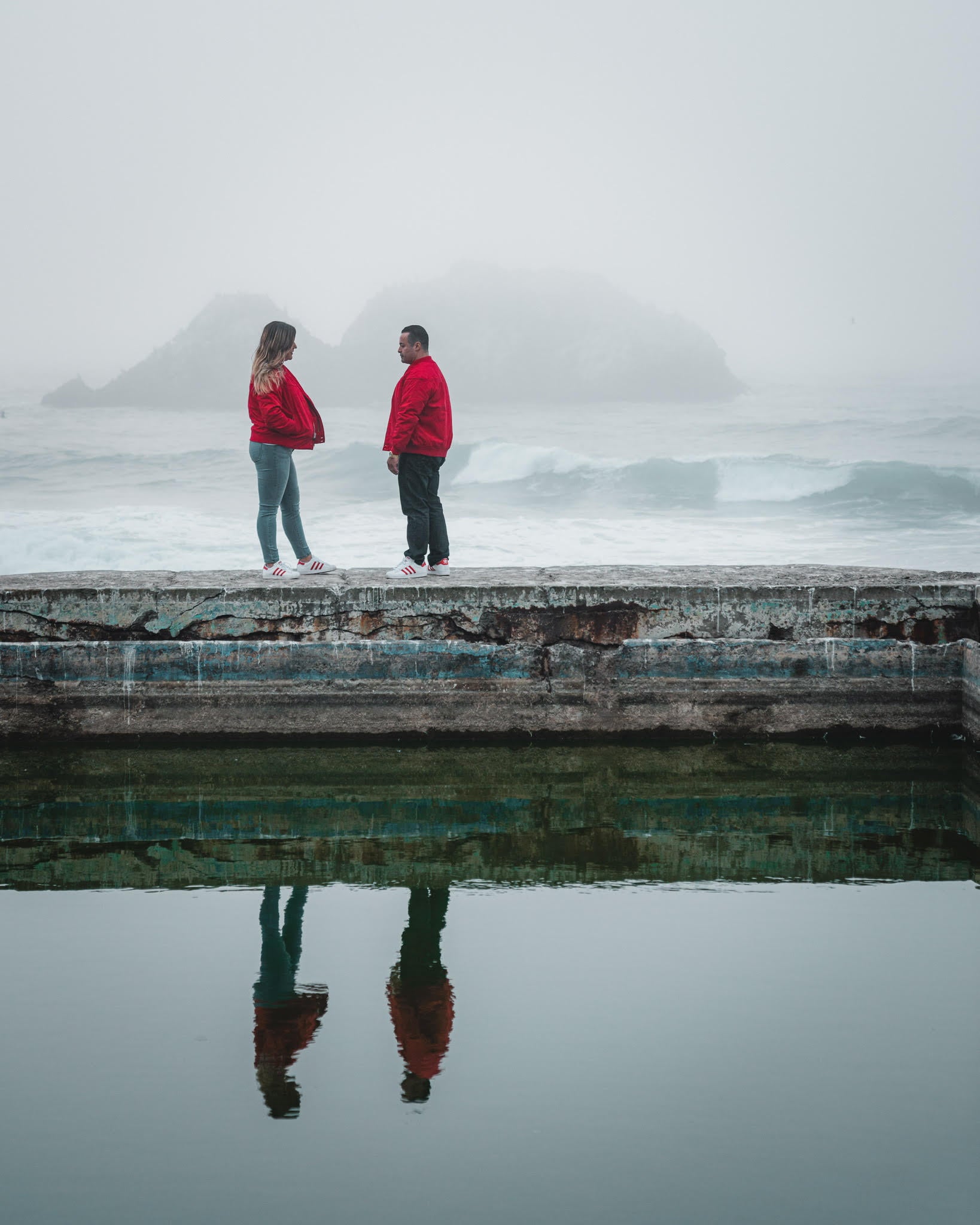 guy and girl wearing a red derby jacket