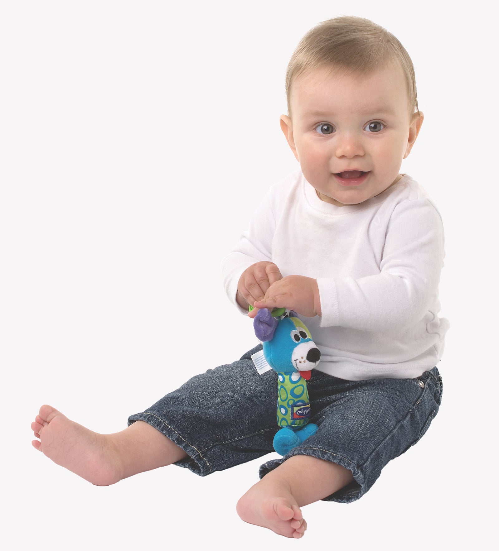 A baby boy holding PLaygro Tinker Toy on his hand
