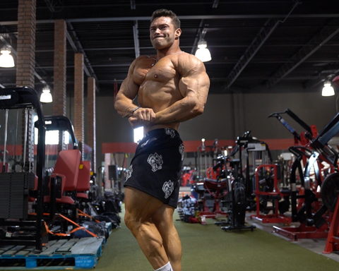 man with big muscles in gym