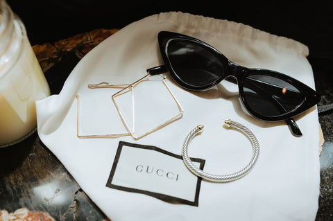 Where Do Luxury Clothing Brands Like Gucci & Versace Manufacture Products?