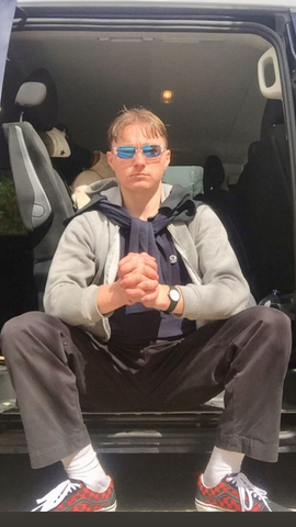 Ben Sitting Sunglasses