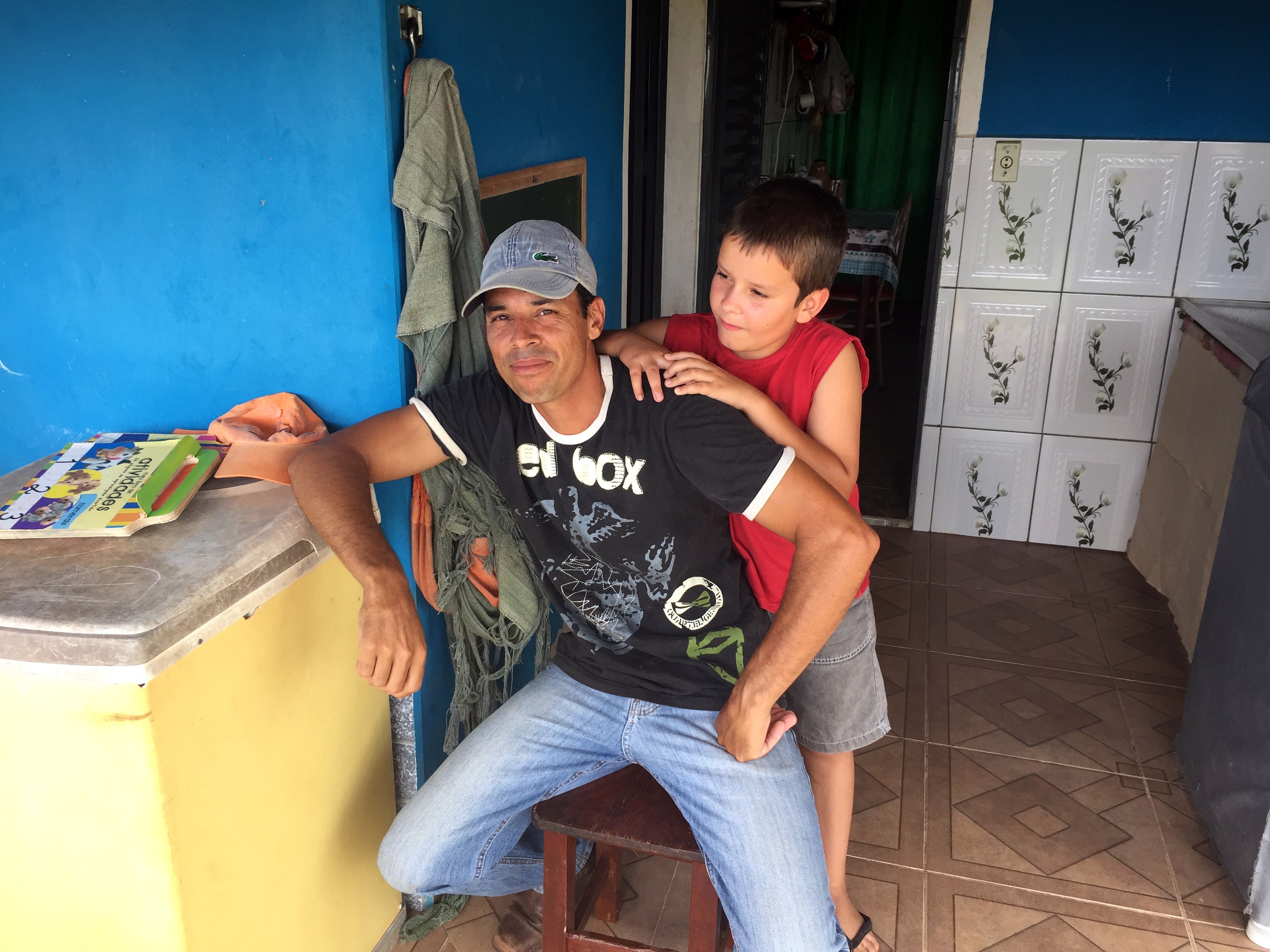 Valdir Ferreira and his son