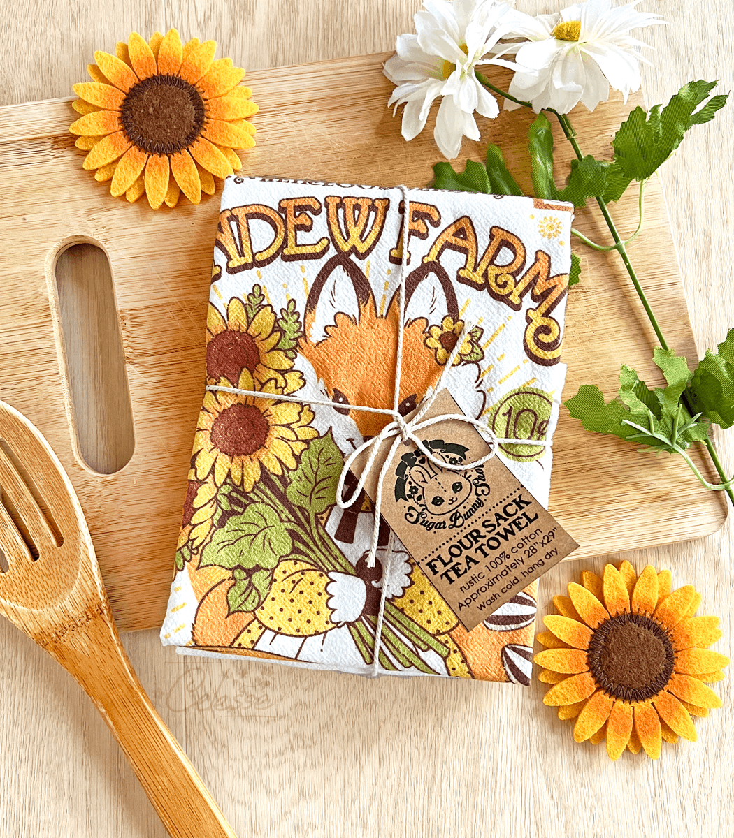 https://cdn.shopify.com/s/files/1/0060/6692/products/sundew-farms-sunflower-fox-flour-sack-tea-towel2.png?v=1678999750&width=1100