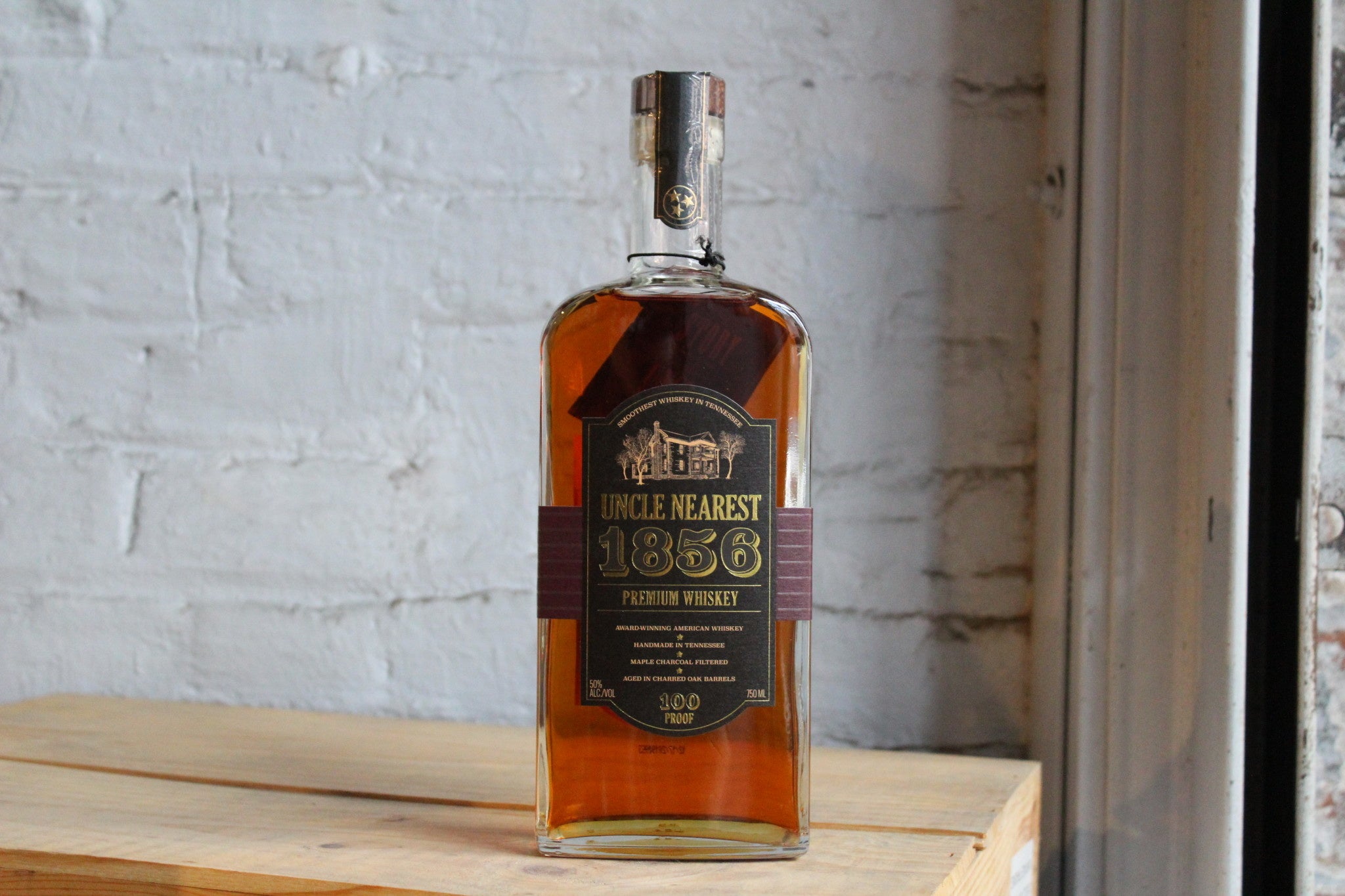 https://cdn.shopify.com/s/files/1/0060/7558/0489/products/uncle-nearest-1856-premium-whiskey-tennessee-750ml.jpg?v=1659387242&width=2048