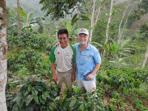 Dean and farmer in shade grown coffee farm