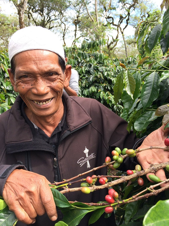 Salim showing off the harvest of longberry