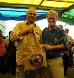 Dean and friend with tote bag made from coffee burlap sack.