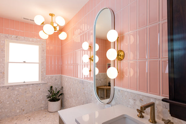Bold and colorful bathroom, custom mirror by Edgework Creative
