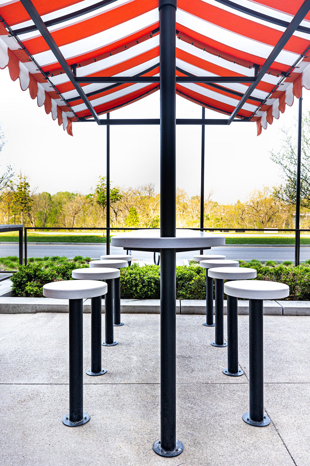 Outdoor seating and tables by Edgework Creative