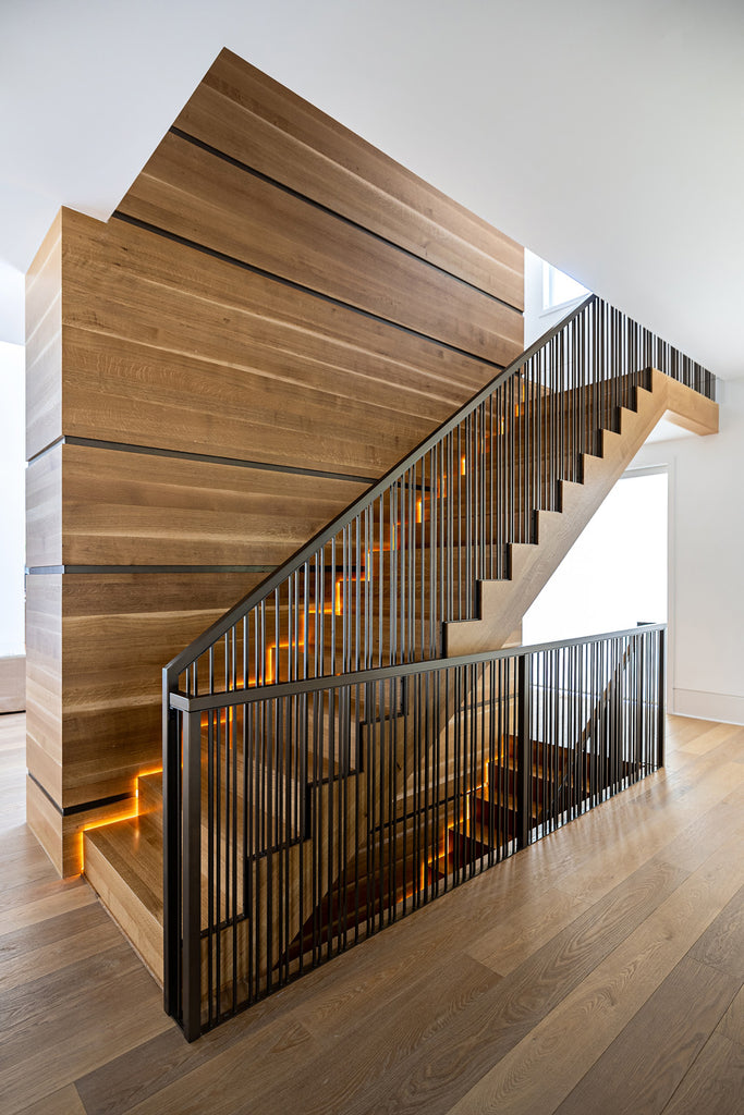 Metal stair railings by Edgework Creative