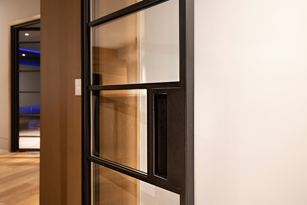 Metal and glass wine room doors by Edgework Creative
