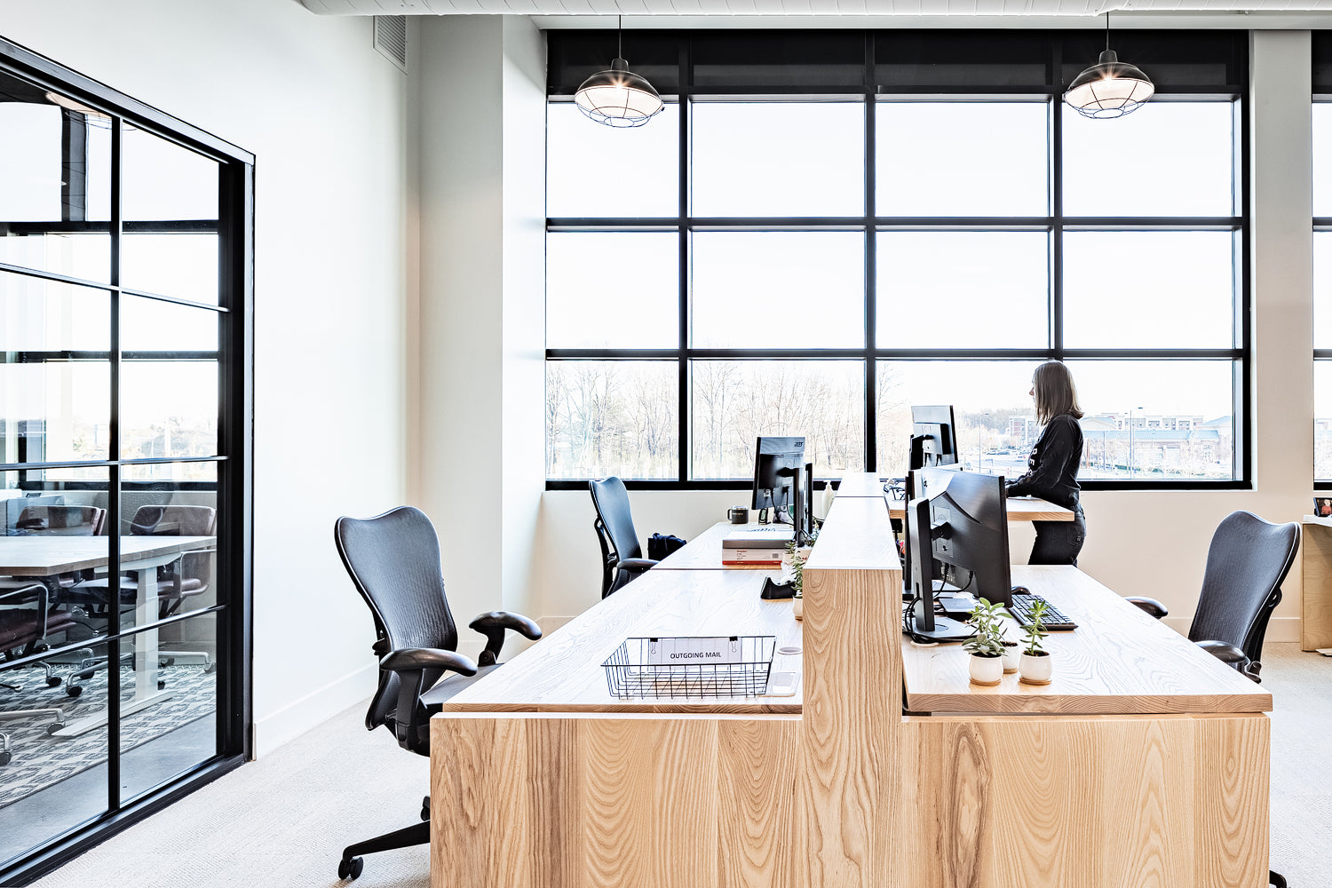 Work stations by Edgework Creative, adjustable height desks