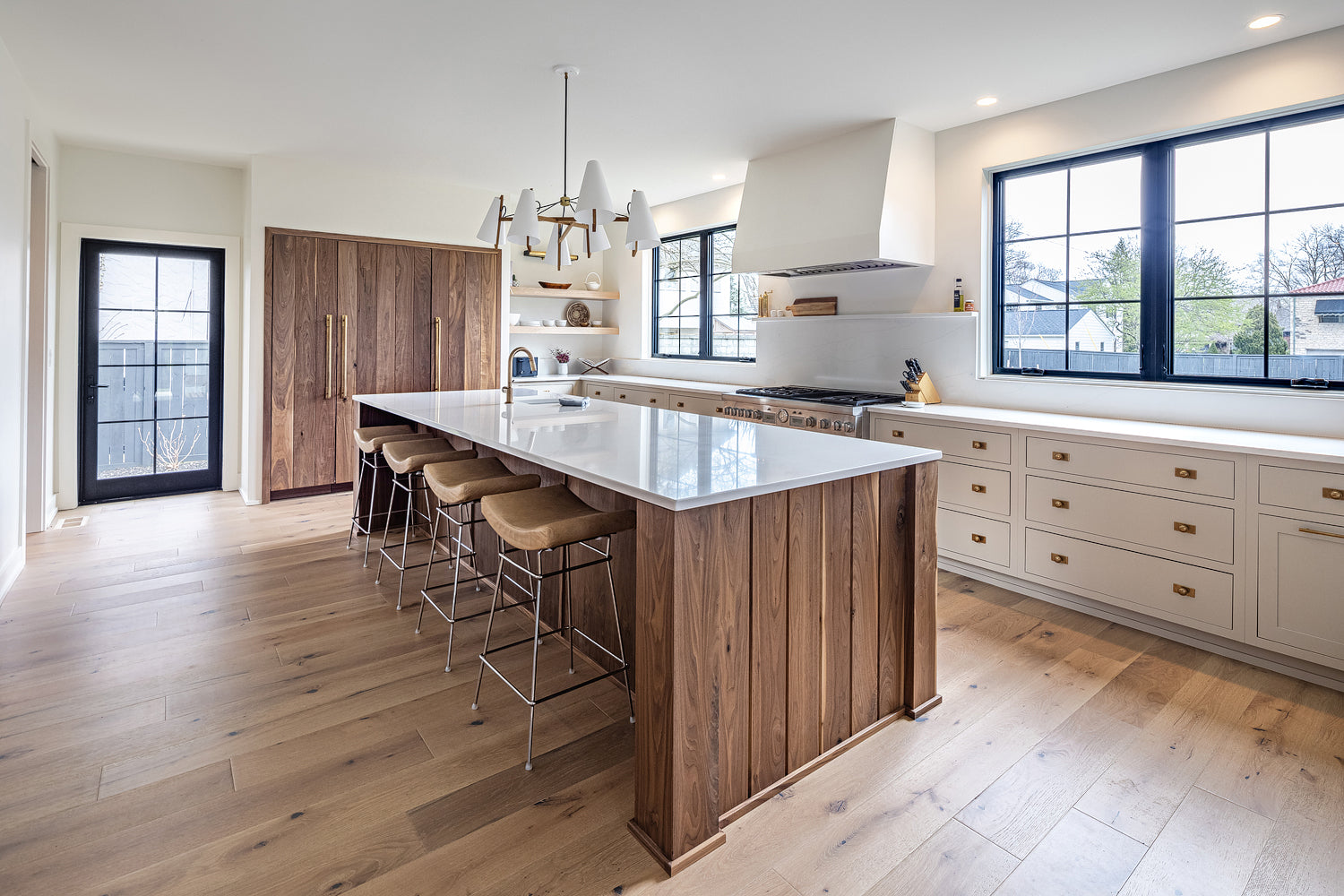 Walnut kitchen cabinetry by Edgework Creative