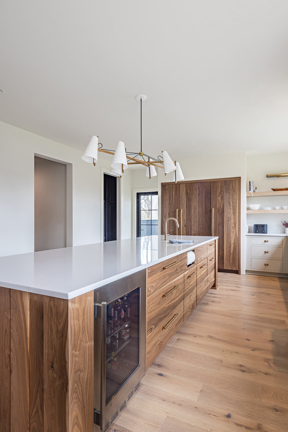 Walnut kitchen island by Edgework Creative