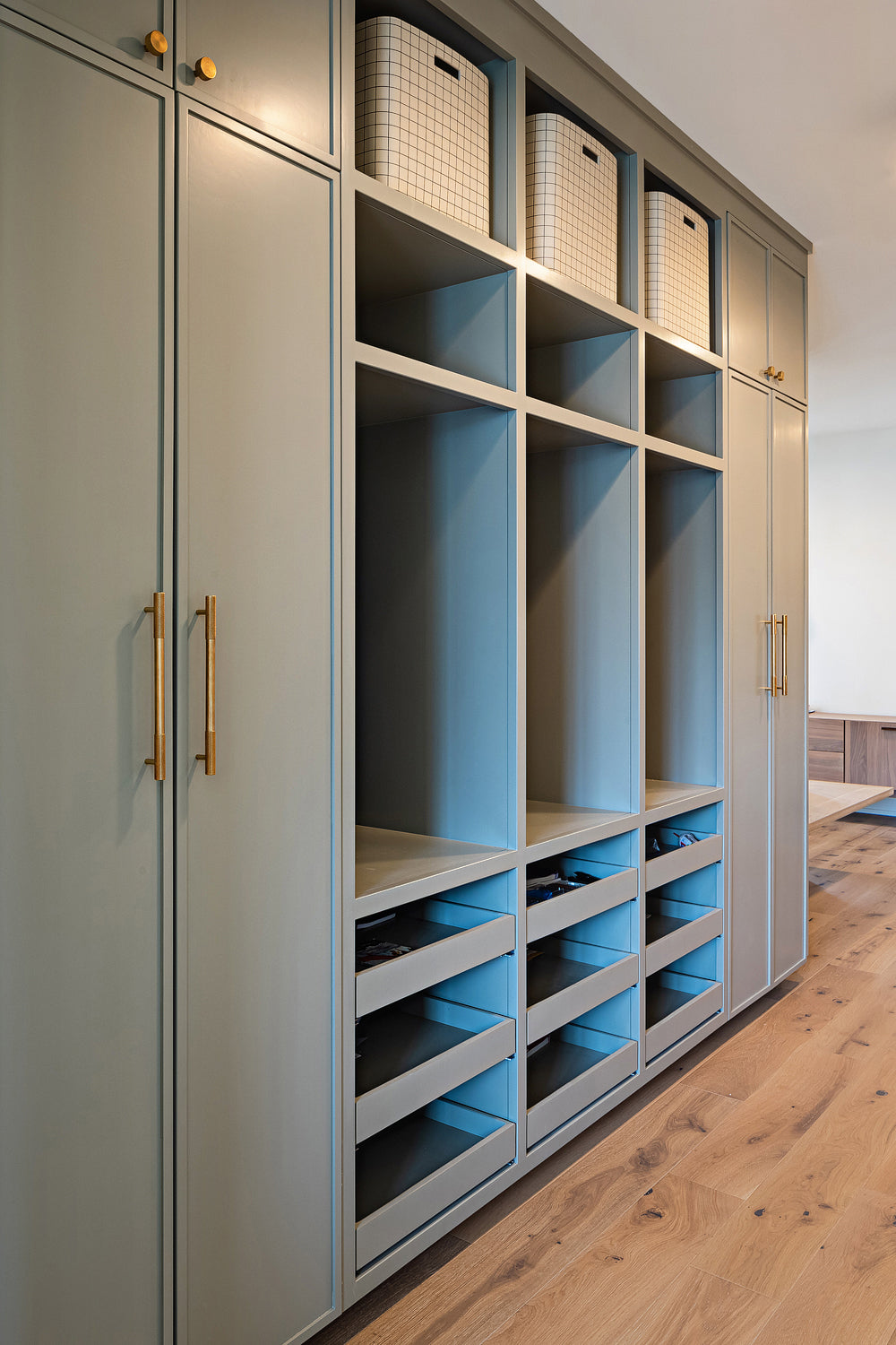 Mudroom storage by Edgework Creative