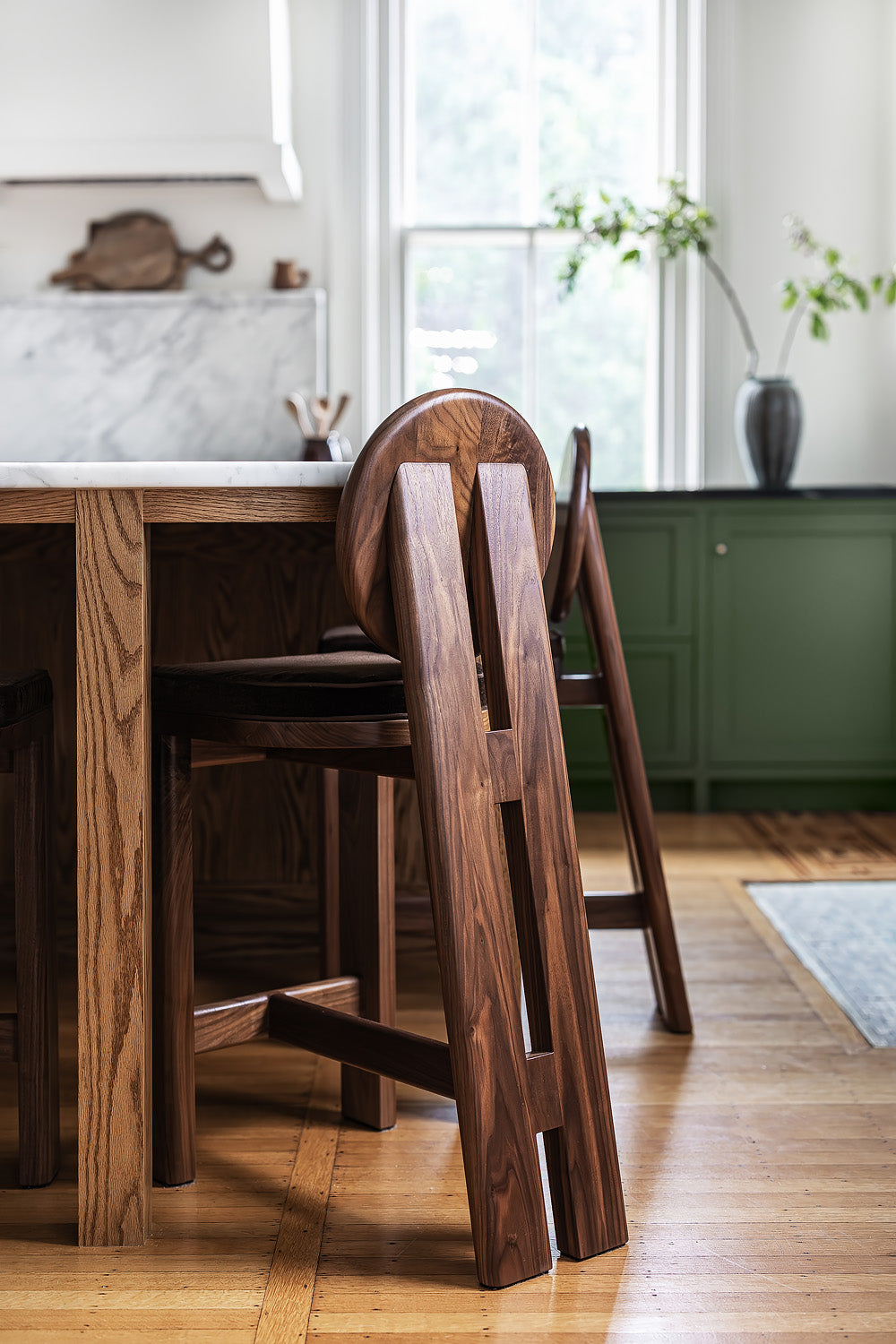 Walnut kitchen stools by Edgework Creative