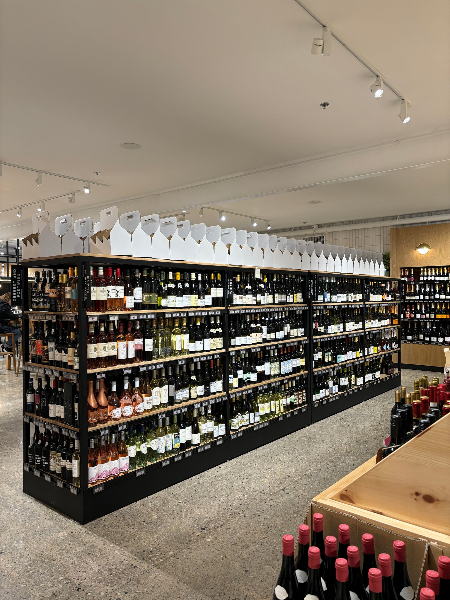 Wine shelving by Edgework Creative