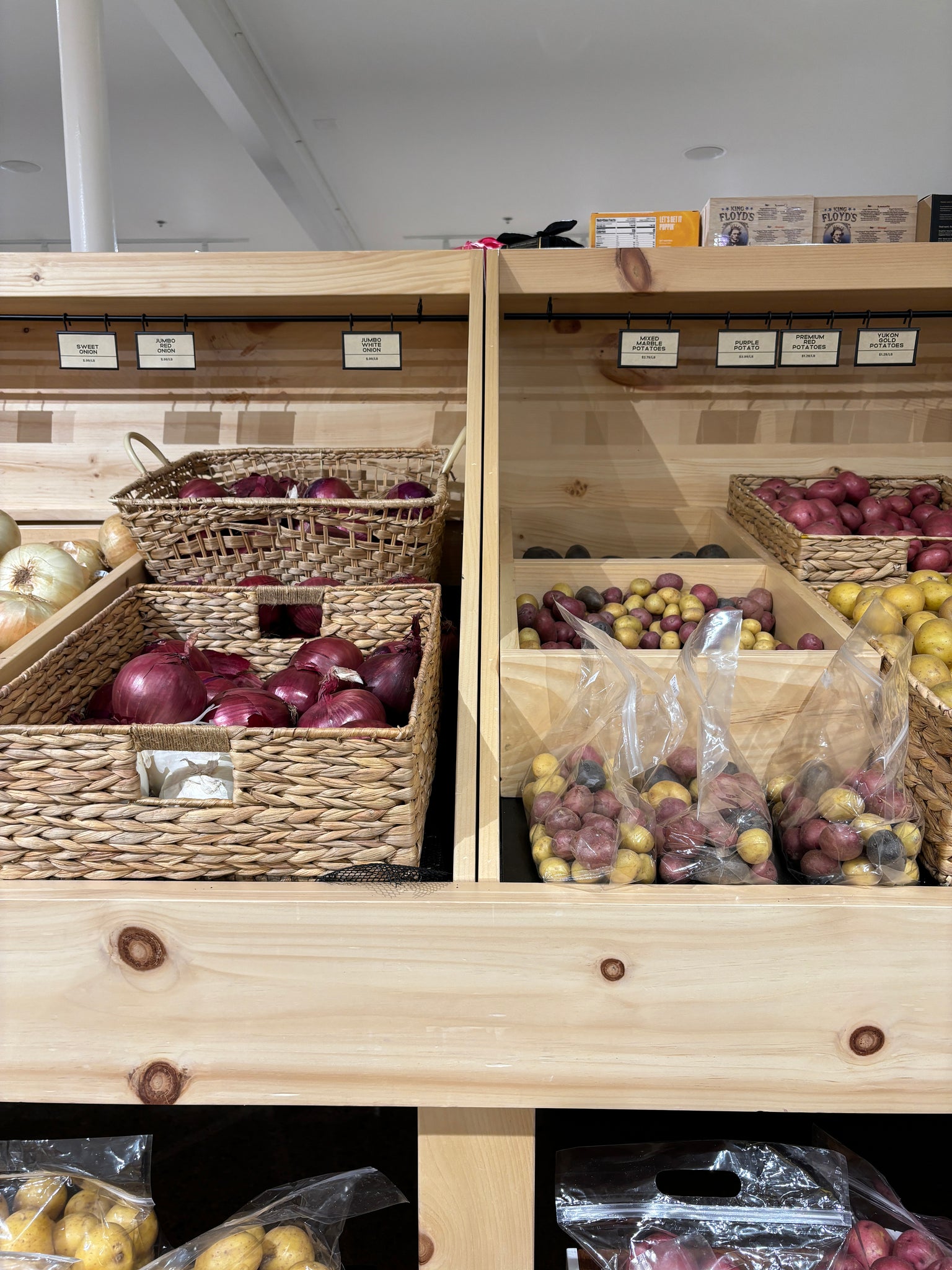 Grocery market display shelving by Edgework Creative