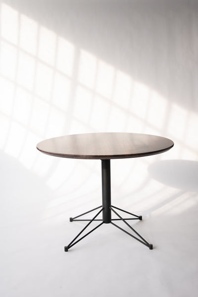 Round dining tables by Edgework Creative