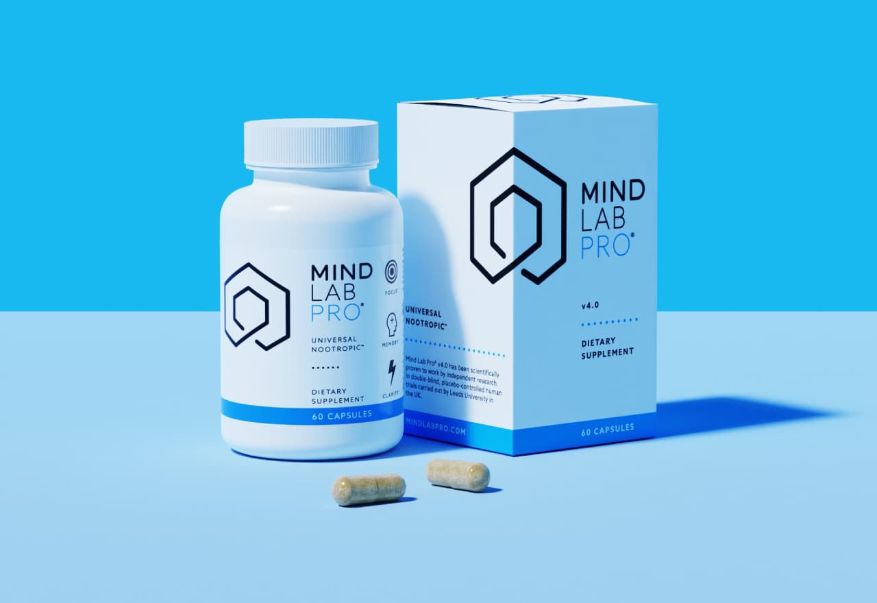 Mind Lab Pro® bottle and box against a blue background -- the Best Nootropic Supplement to Stack with Caffeine