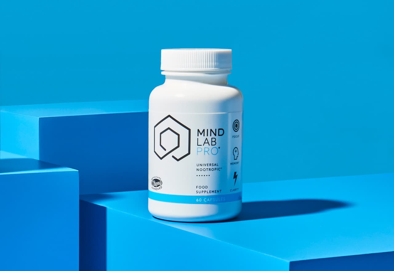 Mind Lab Pro® - The #1 Nootropic Supplement. White bottle shown against a blue background.
