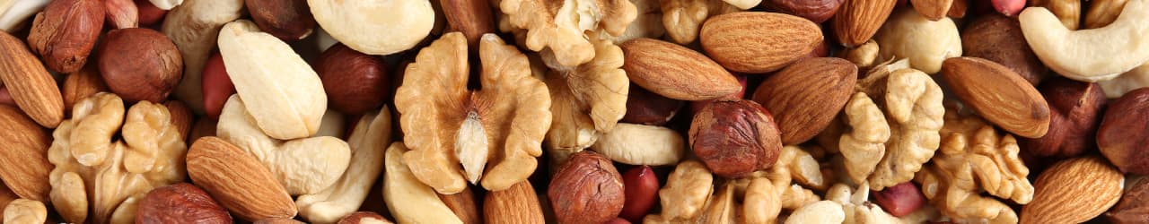 A variety of nuts that supply L-Tryptophan, including walnuts, cashews, almonds and hazelnuts.
