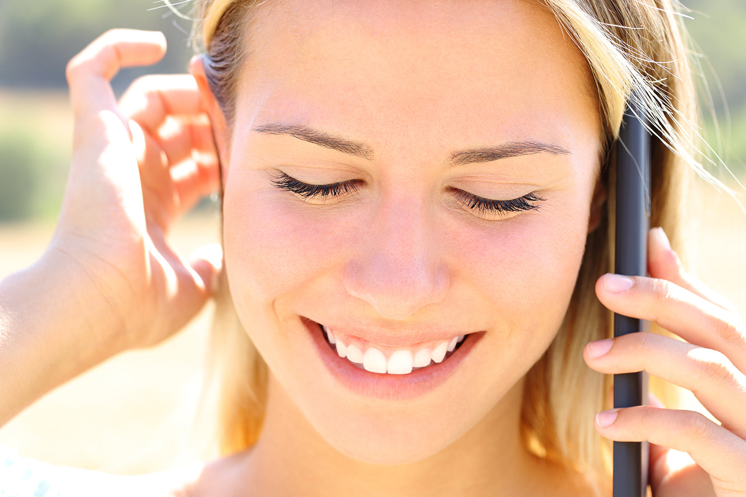 Happy Girl Talking on the Eco-Friendly Phone