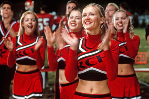 Cheerleaders cheering