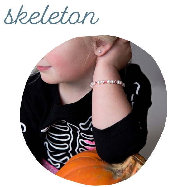 skeleton halloween costume with pearls.