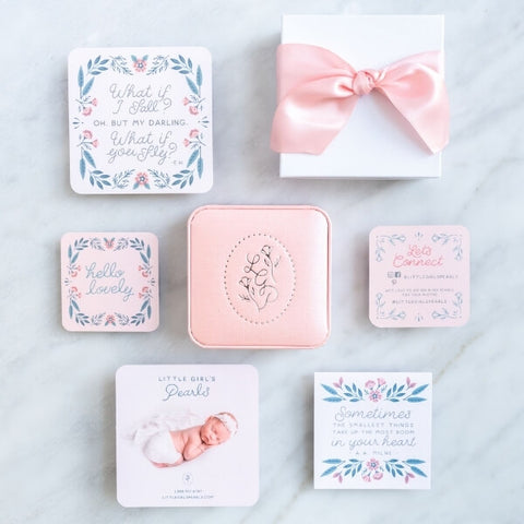 Gift packaging with pink jewelry box, white gift box with pink box, and floral cards