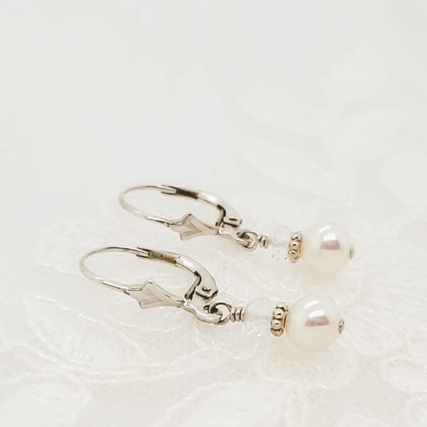 Fleur de Lis sterling silver, pearl, April birthstone earrings for girls.