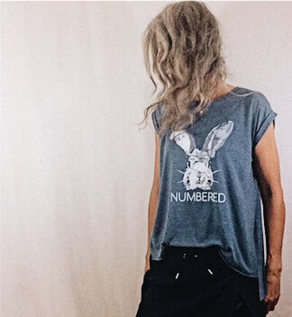 women's blue tshirt hare hair numbered