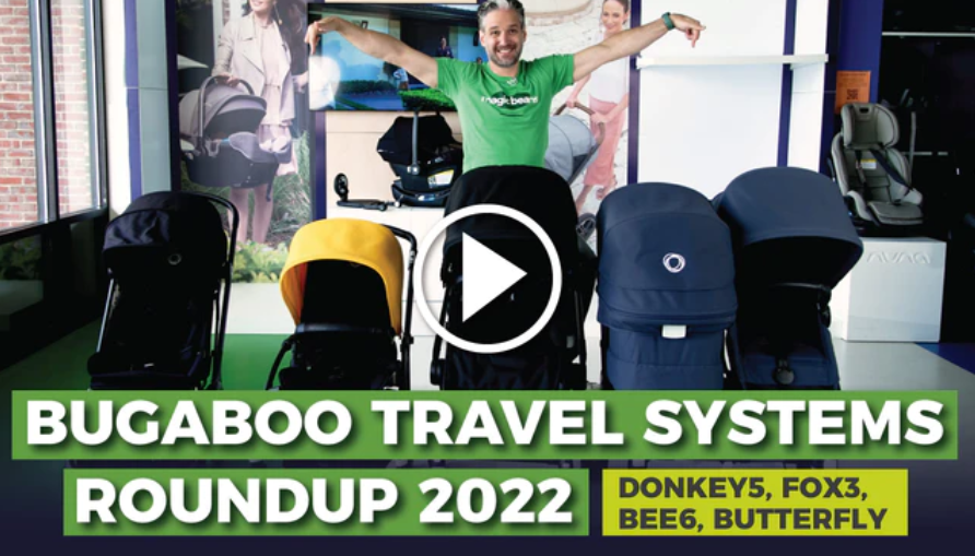 man stands in front of four bugaboo strollers. image is a link to a youtube video comparing the bugaboo travel systems.