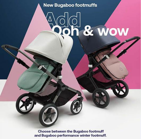 Two strollers outfitted with pink and green Bugaboo footmuffs