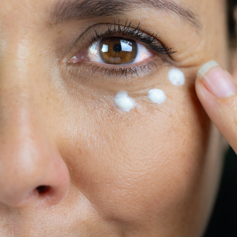 applying eye cream