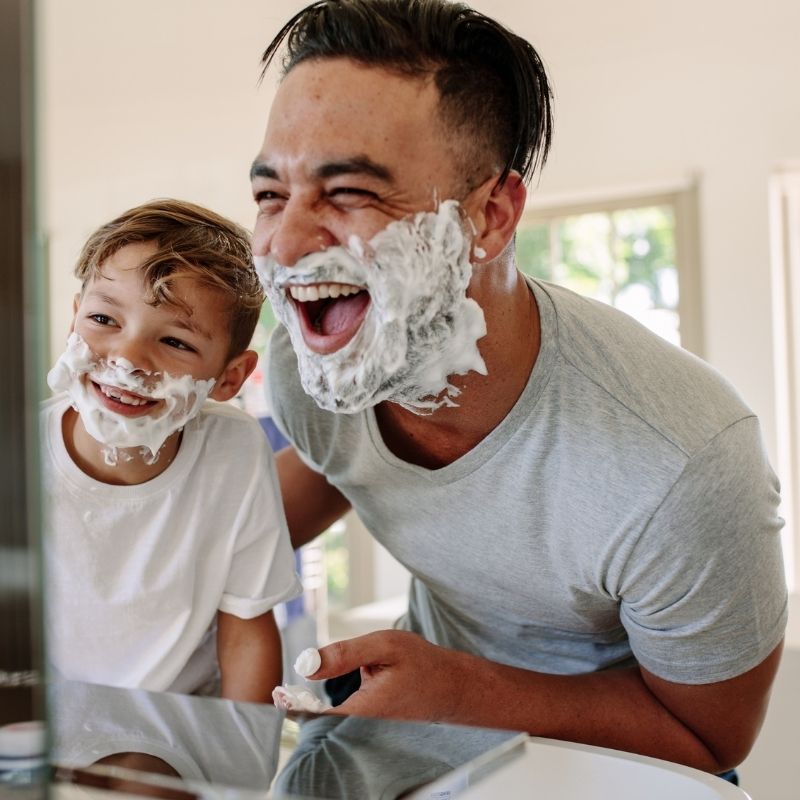 Image of a father and sun shaving with CameLife Facial Cleansing Bar   