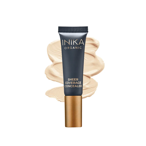 Tube of INIKA Organic Sheer Coverage on white background with swatch